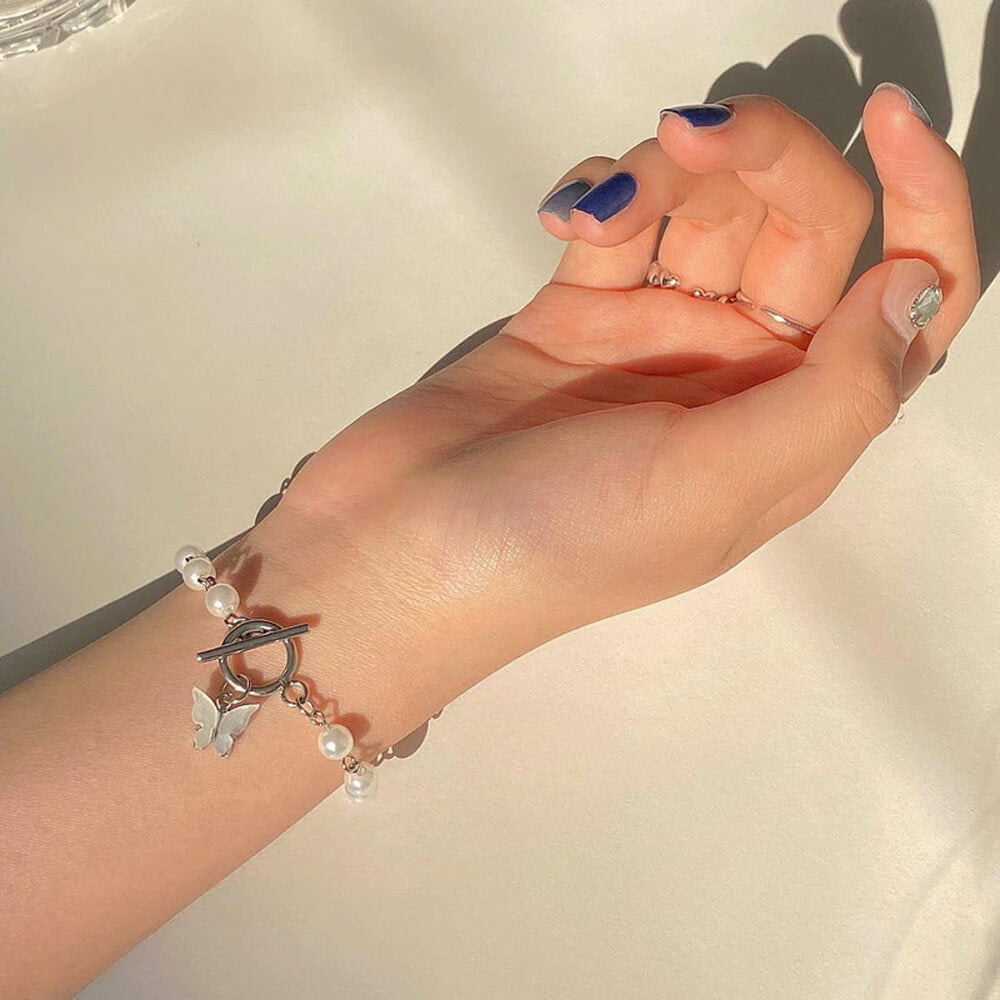 Butterfly Charm Bracelet With Pearl Chain. Shop Bracelets on Mounteen. Worldwide shipping available.